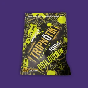 A bag of Tripnotik Lemon Lime Gummies, on a purple background. | Mush.City