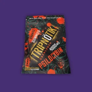 A black Tripnotik Orange Gummies bag with orange text on it. | Mush.City