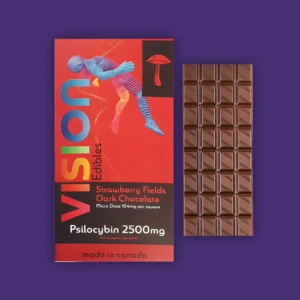 A Vision Edibles Strawberry Fields Dark Chocolate bar with a red and blue background. | Mush.City