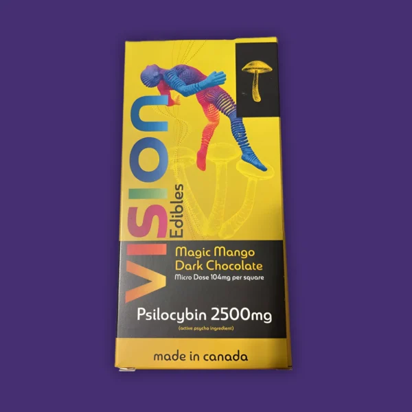 A Vision Edibles Magic Mango Dark Chocolate Bar with the word "Vision" on it. | Mush.City